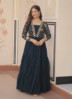 Garb These Beautiful Looking Party Wear Readymade Long Gown.These Gown is Fabricated On Faux Georgette.Its Beautified With Designer Jari,Sequance Embroidary Work.