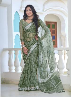Garb These Fastive Saree in Fine Colored.These Saree Are Linen Cotton And Blouse is Fabricated On Linen Cotton Pair.Its Beautified With Wevon Jari Border With Designer Digital Printed.