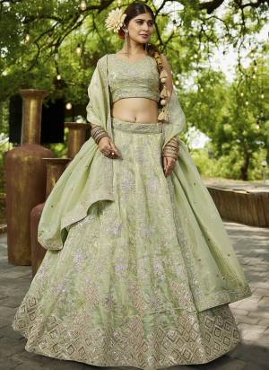 Attrective Looking This Party Wear Fine Color Fancy Heavy Designer Choli And Lahenga Fabriced On Tissue And Dupatta Tissue In Fabricated Beautified With Attrective Designer Heavy Sequance,Multy Thread  Embroidery Work. Buy Now.