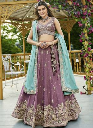 Attrective Looking This Party Wear Fine Color Fancy Heavy Designer Choli And Lahenga Fabriced On Chiffon And Dupatta Chiffon In Fabricated Beautified With Attrective Designer Heavy Sequance,Multy Thread  Embroidery Work. Buy Now.