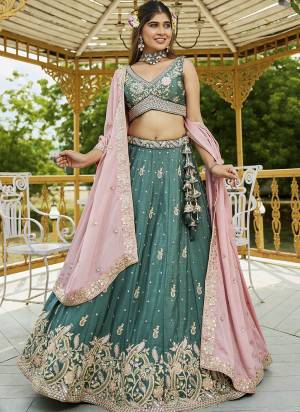 Attrective Looking This Party Wear Fine Color Fancy Heavy Designer Choli And Lahenga Fabriced On Chiffon And Dupatta Chiffon In Fabricated Beautified With Attrective Designer Heavy Sequance,Multy Thread  Embroidery Work. Buy Now.
