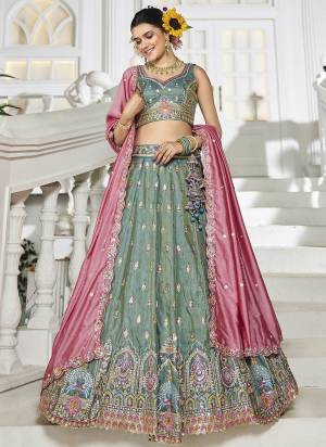 Attrective Looking This Party Wear Fine Color Fancy Heavy Designer Choli And Lahenga Fabriced On Tissue And Dupatta Tissue In Fabricated Beautified With Attrective Designer Heavy Sequance,Multy Thread  Embroidery Work. Buy Now.
