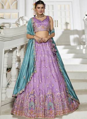 Attrective Looking This Party Wear Fine Color Fancy Heavy Designer Choli And Lahenga Fabriced On Tissue And Dupatta Tissue In Fabricated Beautified With Attrective Designer Heavy Sequance,Multy Thread  Embroidery Work. Buy Now.