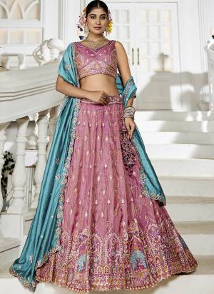 Attrective Looking This Party Wear Fine Color Fancy Heavy Designer Choli And Lahenga Fabriced On Tissue And Dupatta Tissue In Fabricated Beautified With Attrective Designer Heavy Sequance,Multy Thread  Embroidery Work. Buy Now.