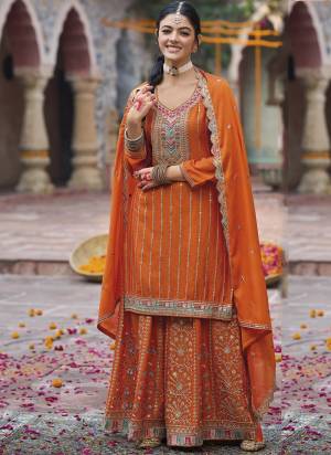 Garb These Party Wear Designer Plazzo Suits in Fine Colored Pair With Dupatta.These Top Are Chinon And Dupatta Are Fabricated On Chinon Pair With Chinon Bottom.Its Beautified With Heavy Designer Embroidery Work
