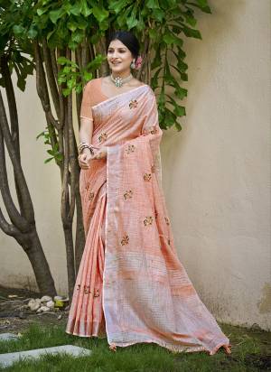 Garb These Fastive And Party Wear Saree in Fine Colored.These Saree And Blouse is Fabricated On Linen.Its Beautified With Wevon Palu Border Designer With Thread Embroidery Work.