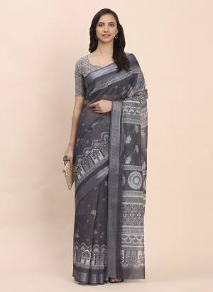 Looking These Fastive And Party Wear Saree in Fine Colored.These Saree And Blouse is Fabricated On Linen Cotton.Its Beautified With Woven Jari Border Designer With Printed.