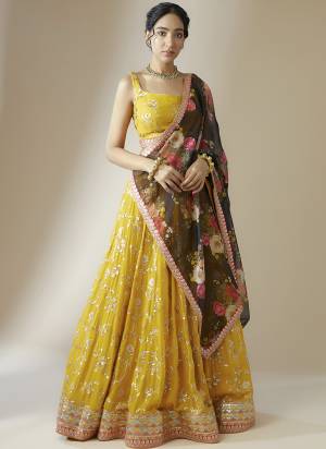 For A Designer Look,Grab These Lehenga Choli in Fine Colored.These Lehenga And Blouse Are Fabricated On Georgette Pair With Dupatta Are Georgette.Its Beautified With Designer Sequance,Jari Embroidery Work.