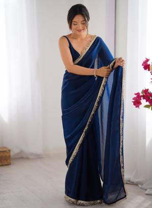 Looking These Party Wear Saree in Fine Colored.These Saree Are Fendy Satin Two Tone And Blouse is Faendy Satin Two Tone Fabricated.Its Beautified With Two Tone Solid With Sequance Lace Border.