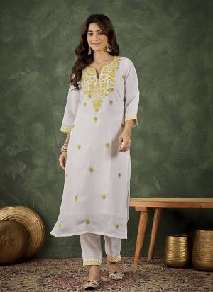 Attrective These Beautiful Looking Readymade Kurti With Bottom.These Kurti And Bottom Are Fabricated On Roman Silk Blend.Its Beautified With Designer Embroidery Work.