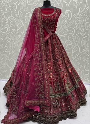 For A Fancy Designer Look,Grab These Lehenga Choli With 2 Dupatta in Fine Colored.These Lehenga And Choli Are Velvet And Dupatta Are Fabricated On Soft Net & Velvet Pair.Its Beautified With Designer Sequance,Mirrar,Dori,Jari Embroidery With Diamond Work. 