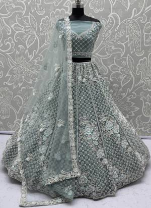 For A Fancy Designer Look,Grab These Lehenga Choli With Dupatta in Fine Colored.These Lehenga And Choli Are Net And Dupatta Are Fabricated On Soft Net Pair.Its Beautified With Fancy Designer Sequance,Dori Embroidery,Crystal Beads Hand Work. 