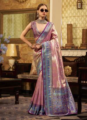 Looking These Party Wear Saree in Fine Colored.These Saree Are Tissue Silk And Blouse is Fabricated On Tissue Silk.Its Beautified With Heavy Woven Jari Designer.