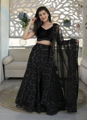 For A Designer Look,Grab These Lehenga Choli in Fine Colored.These Lehenga Are Organza Net And Blouse Are Fabricated On Velvet Pair With Dupatta Are Soft Net.Its Beautified With Designer Thread,Sequance Embroidery Work.