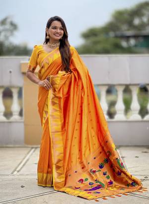 Looking These Party Wear Saree in Fine Colored.These Saree And Blouse is Fabricated On Paithani Silk.Its Beautified With Weaving Meenakari Pallu Jacquard Designer.