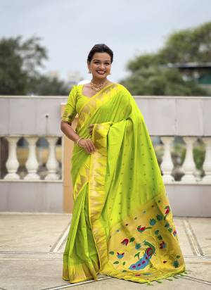 Looking These Party Wear Saree in Fine Colored.These Saree And Blouse is Fabricated On Paithani Silk.Its Beautified With Weaving Meenakari Pallu Jacquard Designer.