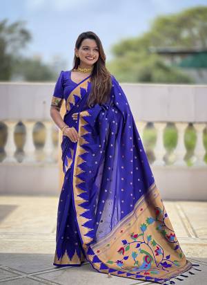 Looking These Party Wear Saree in Fine Colored.These Saree And Blouse is Fabricated On Paithani Silk.Its Beautified With Weaving Meenakari Pallu Jacquard Designer.