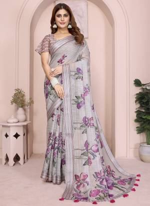 Looking These Party Wear Saree in Fine Colored.These Saree And Blouse is Fabricated On Linen Cotton.Its Beautified With Woven Silver Border Designer With Digital Printed.