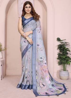 Looking These Party Wear Saree in Fine Colored.These Saree And Blouse is Fabricated On Linen Cotton.Its Beautified With Woven Silver Border Designer With Digital Printed.