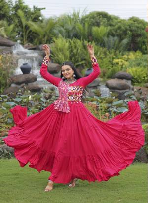 Garb These Beautiful Navratri Wear Readymade Long Gown.These Gown is Fabricated On Rayon.Its Beautified With Designer Kutchi Gamthi Embroidery Work.