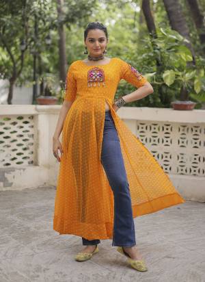 Looking These Beautiful Navratri  Readymade Kurti.These Kurti is Fabricated On Faux Georgette.Its Beautified With Designer Bandhani Printed With Kutchi Gamthi Patch Work.