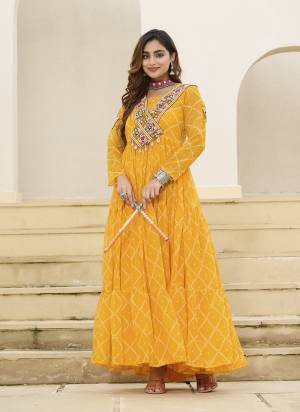 Garb These Beautiful Looking Readymade Navrati Long Gown.These Gown is Fabricated On Faux Georgette.Its Beautified With Bandhani Printed Designer, Kutchi Patch Work.