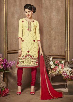 If Those Readymade Suit Does Not Lend You A Desired Fit According To Your Comfort. Than Grab This Dress Material And Get This Stitched Into A Suit Of Your Comfort. This Yellow Colored Top Is Paired With Red Colored Bottom And Dupatta. Buy It Now.