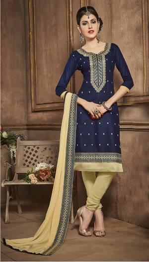 Flaunt Your Rich Taste Even In Your Casuals With This Navy Blue Colored Suit Paired With Cream Colored Bottom And Dupatta. Get This Dress Material Stitched Into A Suit As Per Your Size And Comfort. Buy This Cotton Fabricated Casual Suit Now.