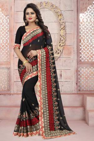 For A Bold And Beautiful Look, Grab This Saree In Black Color Paired With Black Colored Blouse. This Saree And Blouse Are Fabricated On Georgette Beautified With Resham And Jari Embroidery. Buy Now.