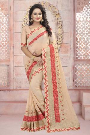 Simple And Elegant Looking Saree Is Here In Beige Color Paired With Beige Colored Blouse. This Saree And Blouse Are Fabricated On Georgette Beautified With Resham And Jari Embroidery All Over. 