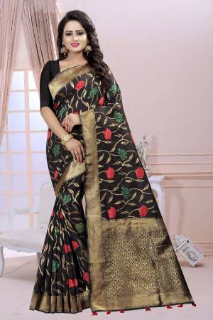 For A Bold And Beautiful Look, Grab This Lovely Saree In Black Color Paired With Black Colored Blouse. This Saree And Blouse Are Fabricated On Linen Beautified With Multi Colored Floral Prints All Over. This Saree Is Light In Weight And Easy To Carry All Day Long. 