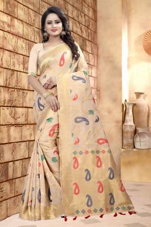 Simple And Elegant Looking Pretty Saree Is Here In Beige Color Paired With Beige Colored Blouse. This Saree And Blouse Are Fabricated On Linen Which Is Soft Towards skin And Light Weight. This Saree Is Suitable For Your Festive Wear Oy Any Social Function. 