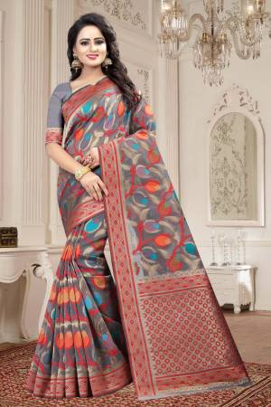 Flaunt Your Rich and Elegant Taste Wearing This Elegant Looking Saree In Grey Color Paired With grey Colored Blouse. This Saree And Blouse are fabricated On Linen Beautified With Multi Colored Prints all Over. Buy This Saree Now.