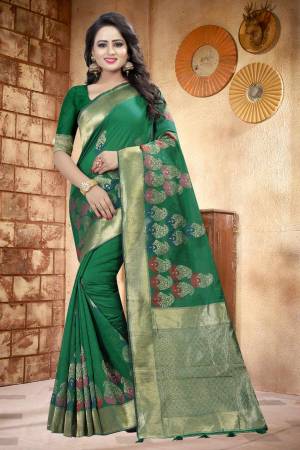 Celebrate This Festive Season With This Pretty Attractive Saree In Green Color Paired With Green Colored Blouse. This Saree And Blouse are Fabricated On Linen Beautified With Prints. It Is Light Weight, Durable And Easy To Drape. Buy This Saree Now.