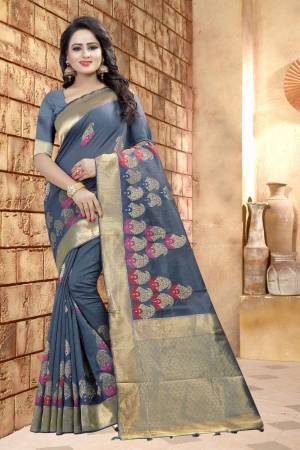 You Will Definitely Earn Lots Of Compliments Wearing This Elegant Saree In Steel Grey Color Paired With Steel Grey Colored Blouse. This Saree And Blouse Are Fabricated On Linen Beautified With Prints. Its Rich Color Will Give An Unique Look To Your Personality. Buy Now.