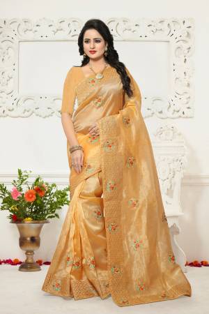 Celebrate This Festive Season With Beauty And Comfort Wearing This Designer Saree In Yellow Color Paired With Yellow Colored Blouse. This Saree IS Fabricated On Orgenza Paired With Art Silk Fabricated Blouse. It Is Easy To Carry Amnd Light Weight.