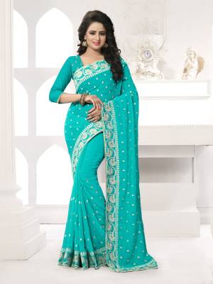 Featuring An Eye Catching design with This Beautiful Designer Saree In Turquoise Blue Color Paired With Turquoise Blue Colored Blouse. This Saree And Blouse are Fabricated On Georgette Beautified With Attractive Embroidery. This Pretty Design Is Available In Many Colors.