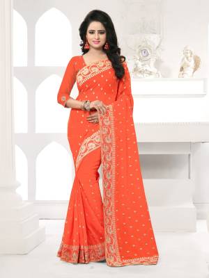 Featuring An Eye Catching design with This Beautiful Designer Saree In Orange Color Paired With Orange Colored Blouse. This Saree And Blouse are Fabricated On Georgette Beautified With Attractive Embroidery. This Pretty Design Is Available In Many Colors.