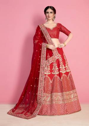 Adorn The Pretty Angelic Look Wearing This Designer Lehenga Choli In Red Color Paired With Red Colored Dupatta. This Bright Red Color And Its Embroidery Will Give Your Personality A Beautiful Look Like Never Before. Ts Blouse And Lehenga Are Fabricated On Art Silk Paired With Net Fabricated Dupatta.