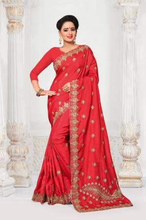 Adorn The Pretty Angelci Look Wearing this Heavy Embroidered Saree In Red Color Paired With Red Colored Blouse. This Saree And Blouse Are Fabricated On Art Silk Beautified With Jari Embroidery And Stone Work.