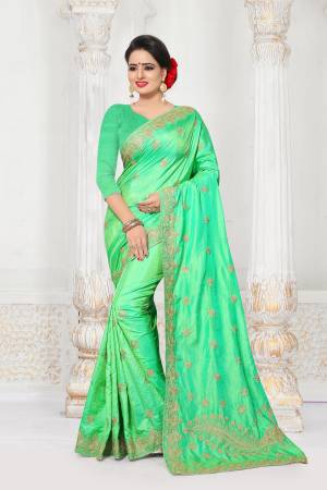 Celebrate This Festive Season Wearing This Designer Saree In Light Green Color Paired With Light Green Colored Blouse. This Saree And Blouse Are Fabricated On Art Silk Beautified With Jari Embroidery And Stone Work.