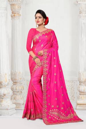 Bright And Visually Appealing Color Is Here With This Designer Saree In Fuschia Pink Color Paired With Fuschia Pink Colored Blouse. This Saree And Blouse Are Fabricated On Art Silk Beautified With Heavy Jari Embroidery And Stone Work.