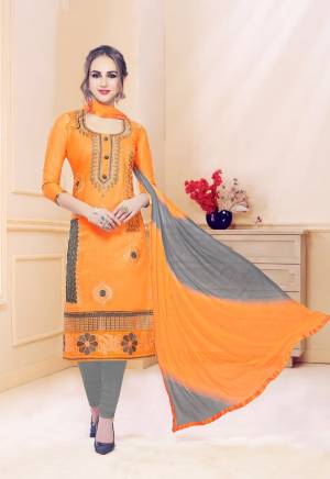 Celebrate This Festive Season With Beauty And Comfort Wearing This Suit In Orange Colored Top Paired With Contrasting Grey Colored Bottom And Shaded Orange & Grey Dupatta. This Dress Material Is Cotton Based Paired With Chiffon Dupatta. Buy Now.