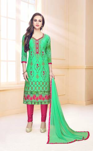 Celebrate This Festive Season With Beauty And Comfort Wearing This Suit In Green Colored Top Paired With Contrasting Dark Pink Colored Bottom And Green Dupatta. This Dress Material Is Cotton Based Paired With Chiffon Dupatta. Buy Now.