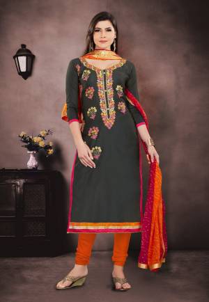 For A Bold and Beautiful Look, Grab This Designer Suit In Dark Grey Colored Straight Suit Paired With Orange Colored Bottom And Orange And Dark Pink Colored Dupatta. Its Top Is Chanderi Based Paired With Santoon Bottom And Chiffon Dupatta. Buy This Suit Now.