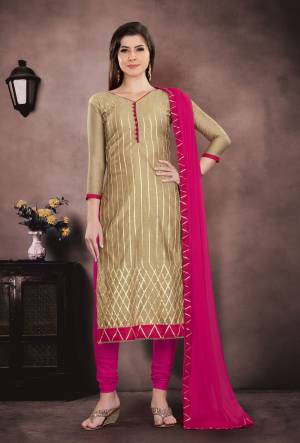 Rich And Elegant Looking Dress Material Is Here In Beige Colored Top Paired With Contrasting Dark Pink Colored Bottom And Dupatta. Its Top Is Chanderi Based Paired With Santoon Bottom And Chiffon Dupatta. Buy This Dress Material Now.