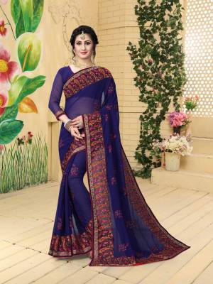 Grab This Beautiful And Attractive Dark Blue Colored Saree Paired With Dark Blue Colored Blouse. This Saree And Blouse Are Fabricated On Georgette Beautified With Multi Colored Resham Work. Buy Now.