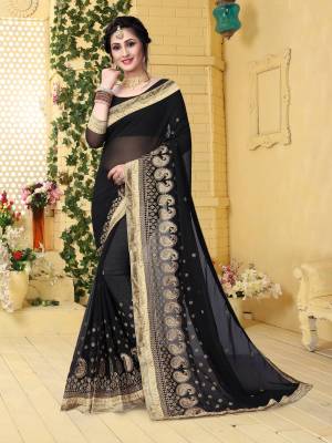 For A Traditional Bold And Beautiful Look, Grab This Designer Saree In Black Color Paired With Black Colored Blouse. This Saree And Blouse Are Fabricated On Georgette Beautified With Jari Embroidery Embroidery. 