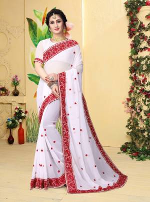 Simple and Elegant Looking Saree Is Here In White Color Paired With White Colored Blouse. This Saree And Blouse Are Fabricated On Georgette Beautified With Resham Embroidery. Buy Now.