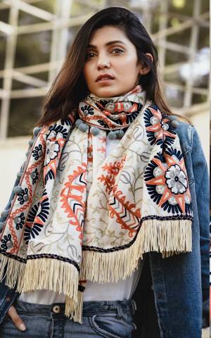 Grab This Beautiful Scarf For This Winter Which Can Be Paired With Western Or Even Kurtas. It Is Fabricated On Khadi Beautified With Woollen Thread Work. Buy Now.